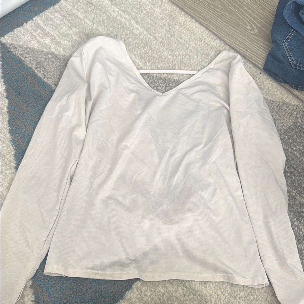 White, twist open back zyia shirt